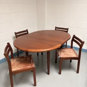 G Plan Mid Century round extendable butterfly leaf dining table and four ladderback chairs